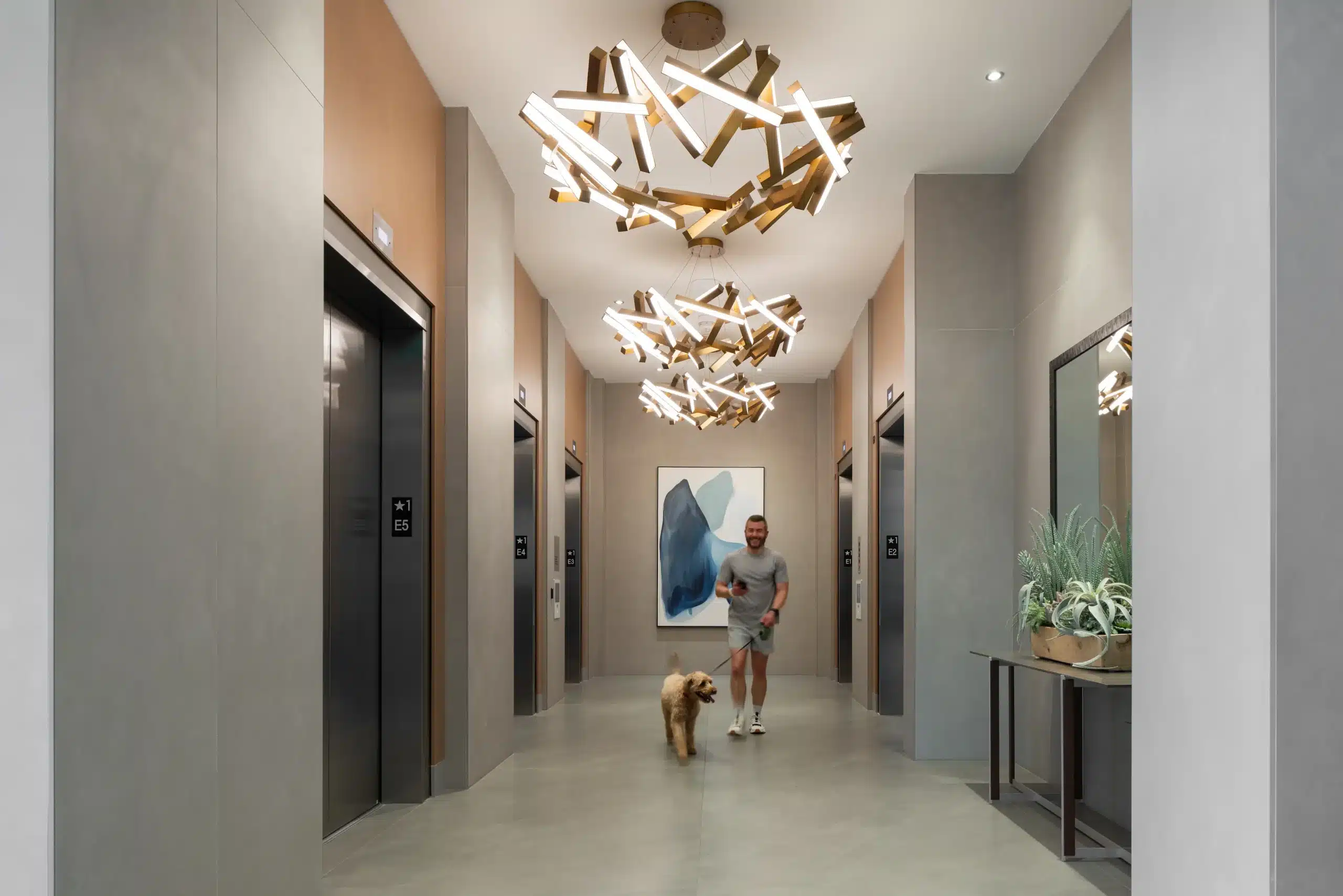 The Travis ATX elevator lobby with sculptural ceiling lights