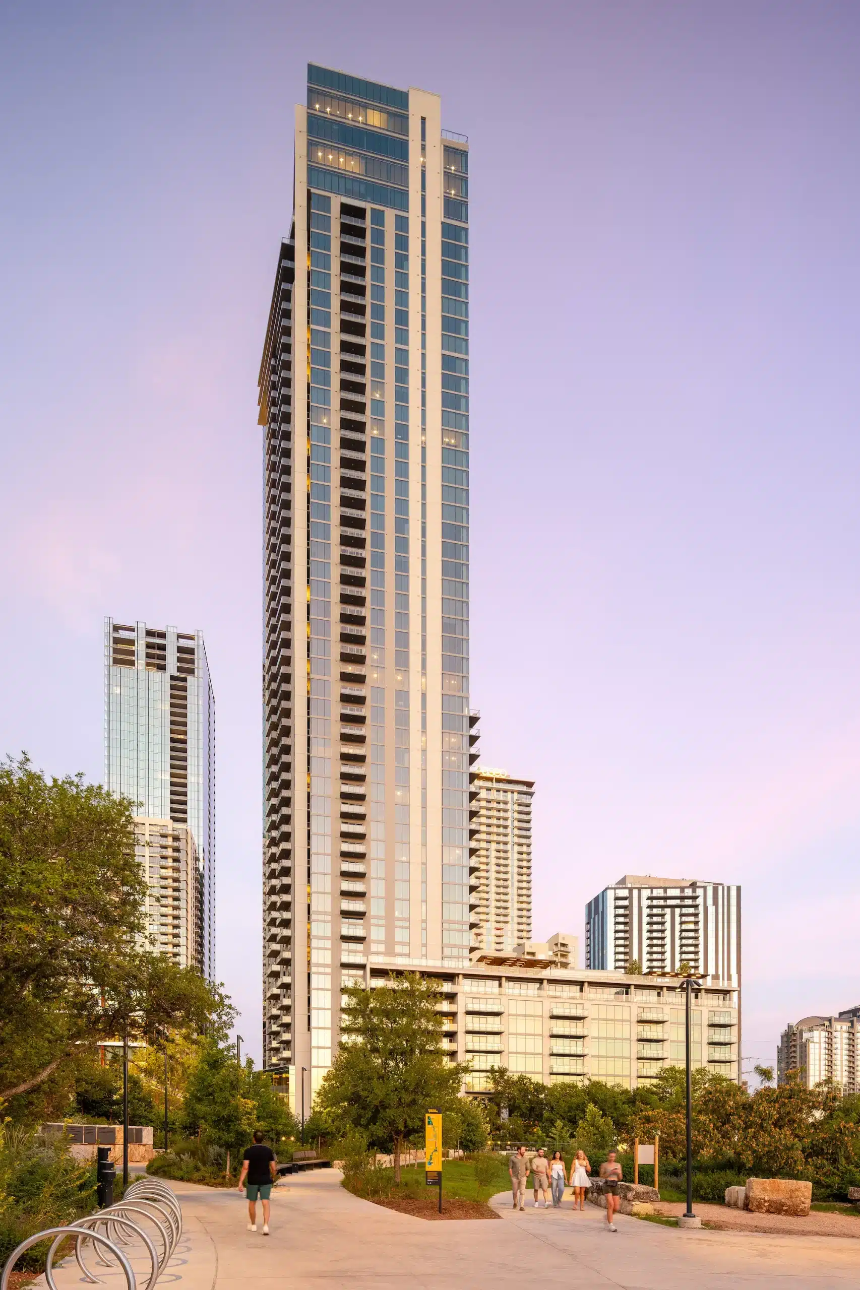 The Travis ATX residential tower exterior beside Waterloo Trail